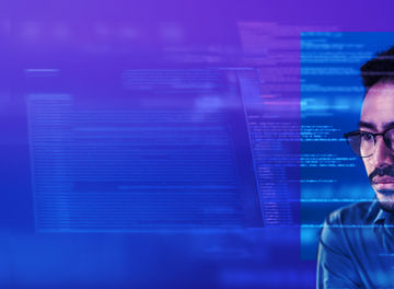 man looking at codes