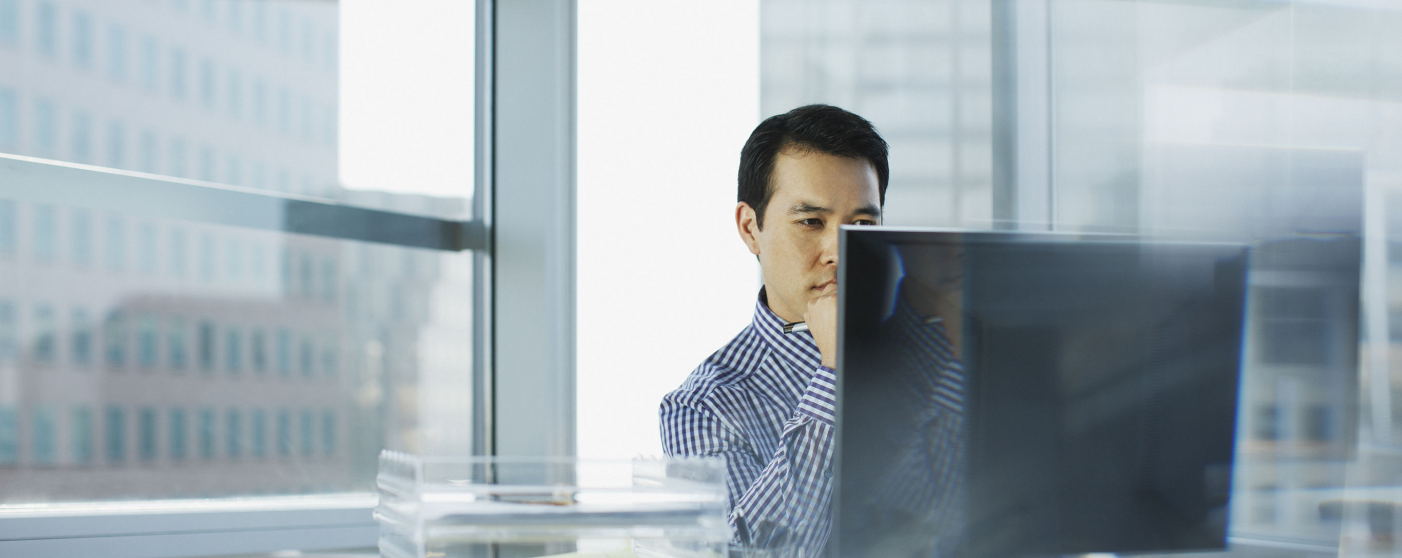 Businessman working at desk in office