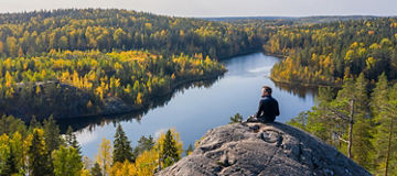 Man looking at lake