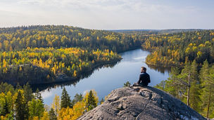 Man looking at lake