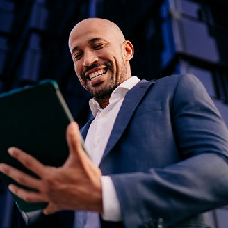 man looking at tablet