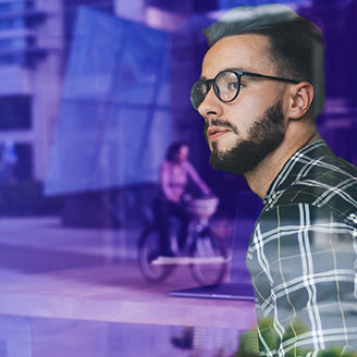 Man looking out of window