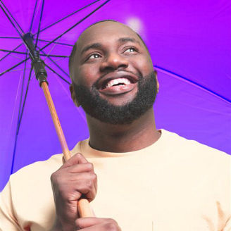 businessman protected under umbrella