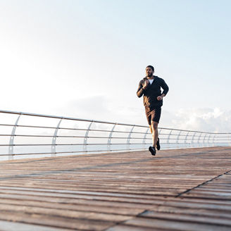 man running on the bridge