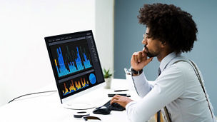 Man sitting behind his computer