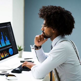 Man sitting behind his computer