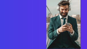 man sitting with phone cover