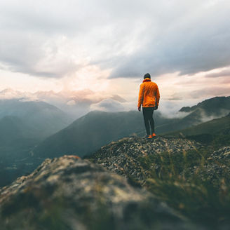 Man standing on mountain top