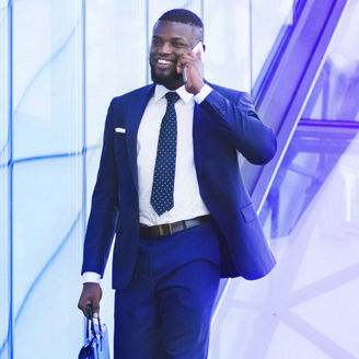 Man Talking on phone while walking