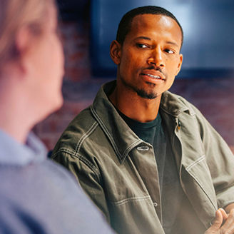 Man talking with woman
