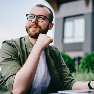  Man Thinking with Laptop