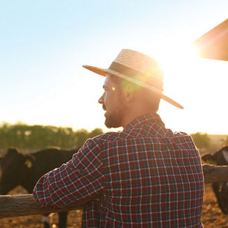 Man wearing hat in farm