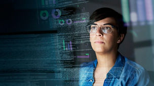 Cropped shot of a young computer programmer looking through data