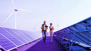 Two farmers in the field wearing masks
