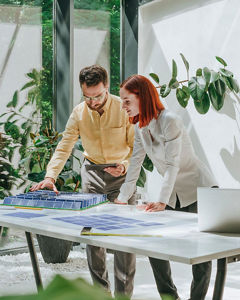 man-woman-working-with-solar-panels
