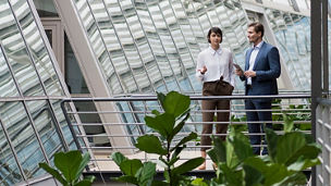 man-women-standing-in-balcony