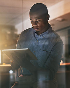 Man looking at tablet