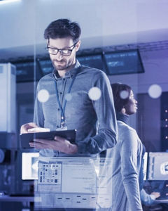 Man looking at tablet