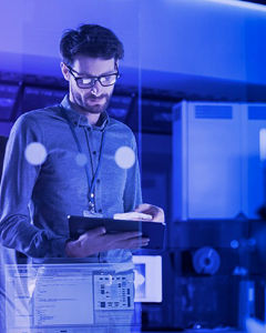 Man looking at tablet