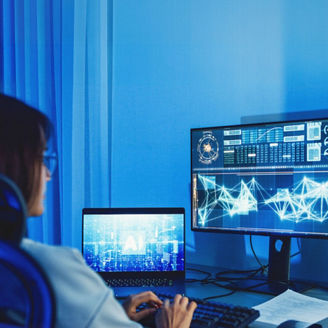 Person working on screens