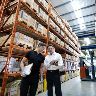 men in warehouse