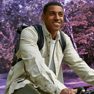 Men on bike in forrest