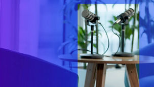 Two microphones on a wooden table