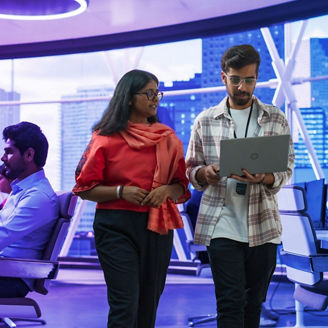 Employees are looking at their laptops