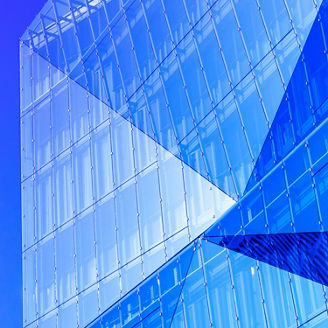 Up low angle view of modern business glass skyscraper and bluesky, Banking licensing, banking licencing, close up