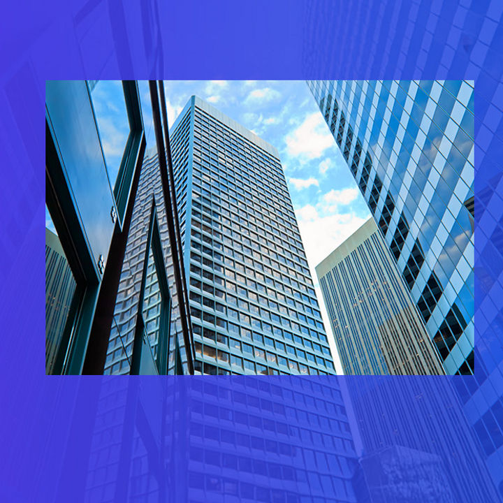 Modern skyscrapers under blue sky banner