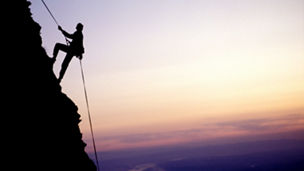 Mountain climber in the evening