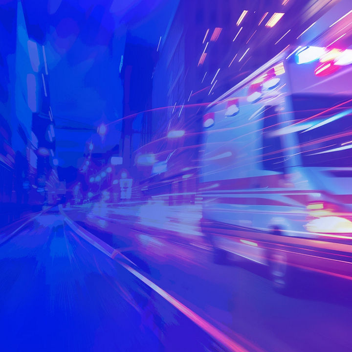 Neon ambulance on road
