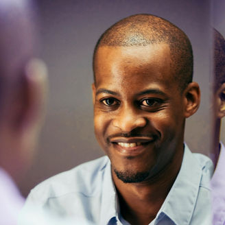 Man looking in the mirror