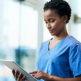 Nurse working on tablet