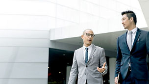 Office collegues black white suit