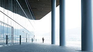 Office glass building lobby with pillars 