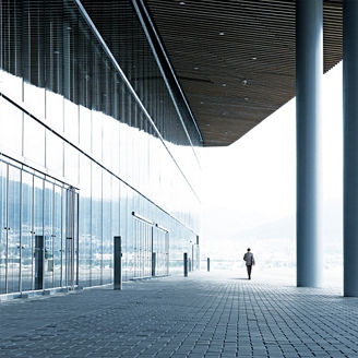 Office glass building lobby with pillars 