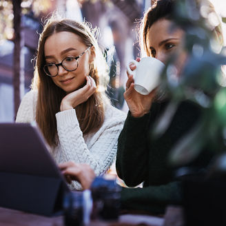 Two woman working outside