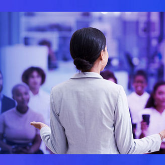 Woman giving speech to employees