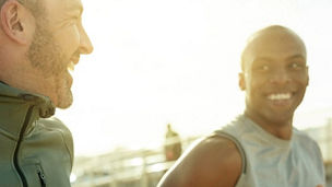 Two colleagues out jogging together