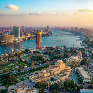 people working looking at papers