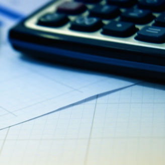 calculator, pen and graph