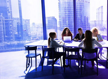 Colleagues at a meeting table