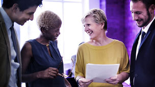 woman laughing in a meeting