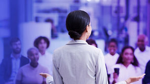 Woman standing in front of a group