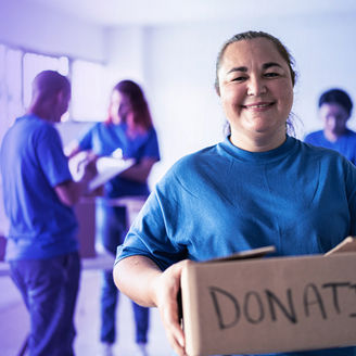 Woman with a donation box in her hands
