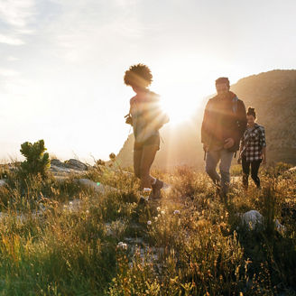 People walking near mountain