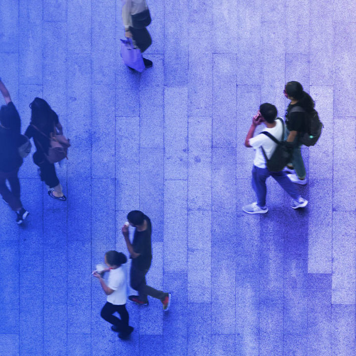 People walking on business street pedestrian