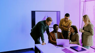 People working a a laptop