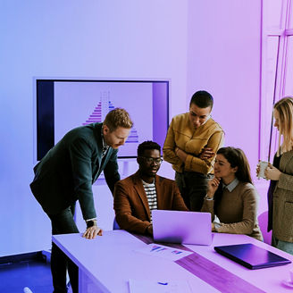 People working a a laptop